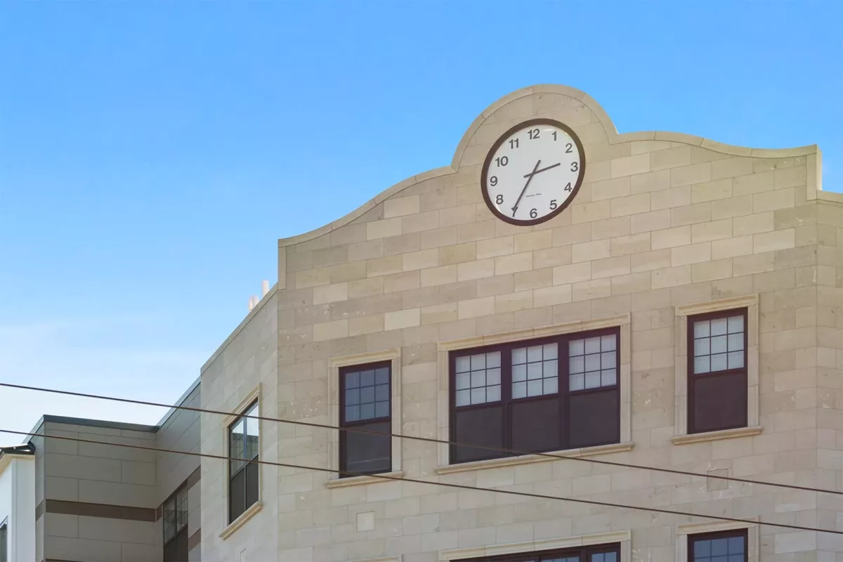 Clock at the top exterior of The Bradford at Belmont
